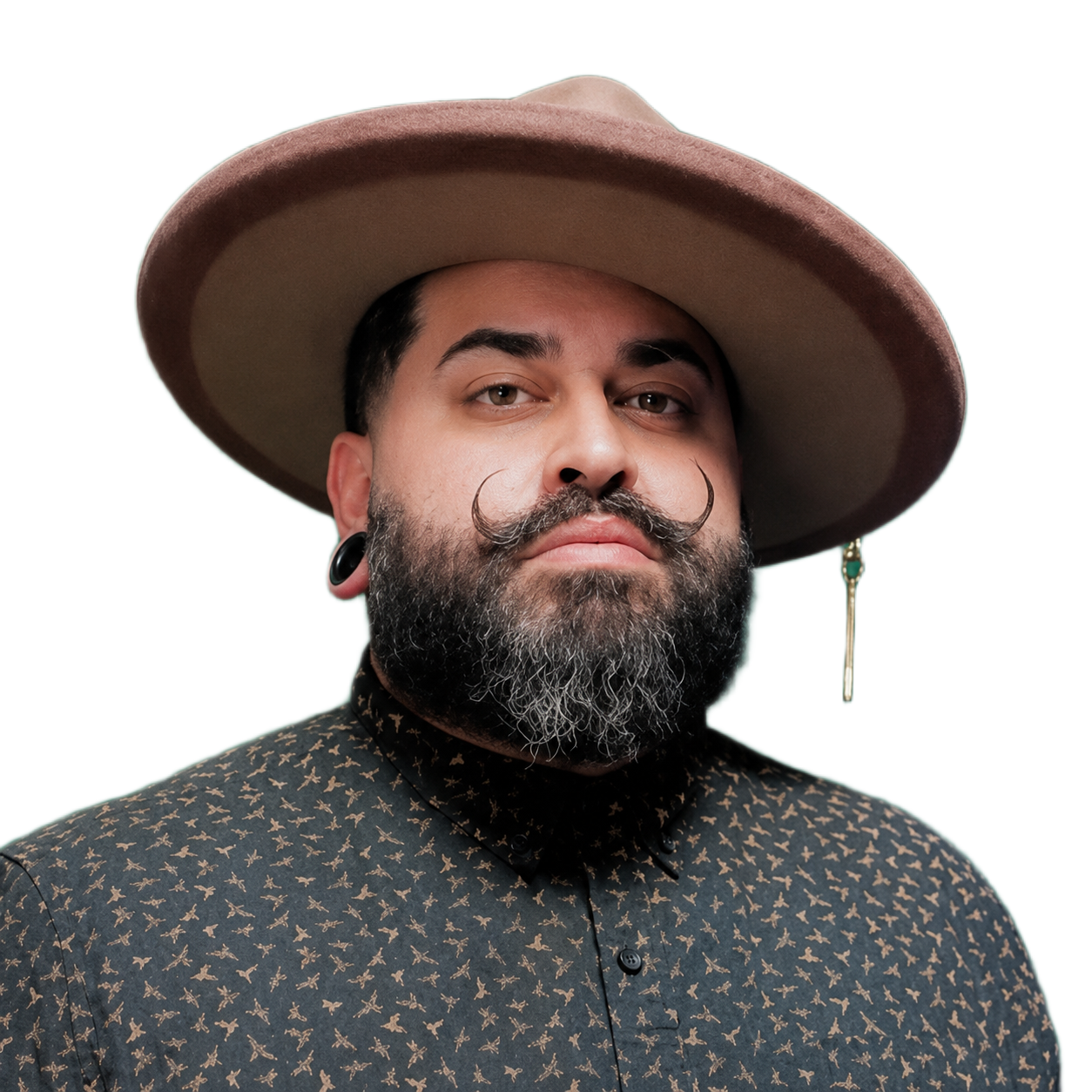 Professional headshot of Primitivo, licensed barber and US Army veteran